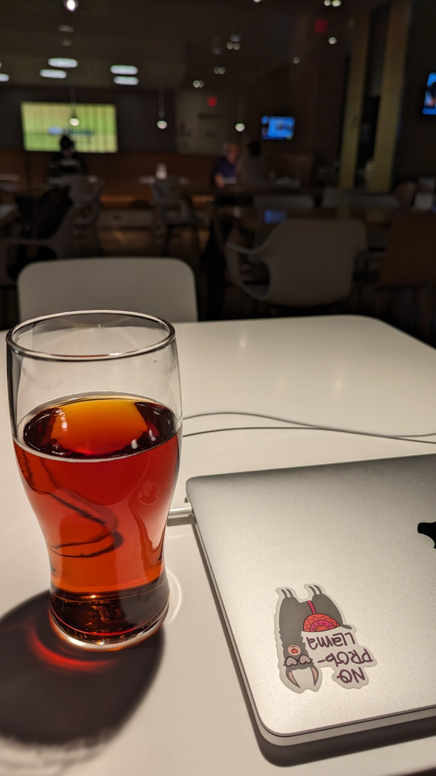 Laptop tucked into a Herschel sleeve